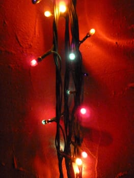 string of lights on a red background