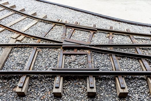 Railway track junction on a gravel bed.