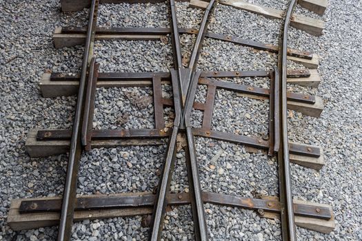 Railway track junction on a gravel bed.