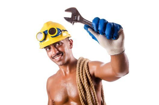 Muscular builder with tools isolated on white