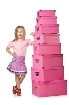 Little cute girl with lots of boxes