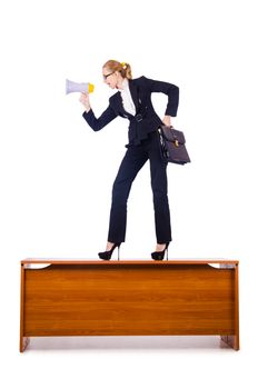 Businesswoman shouting through loudspeaker