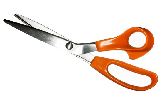 Close up of pinking shears for dressmaking against white background