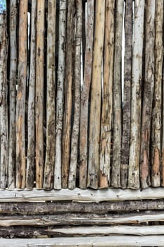 Traditional wooden rural wall from old logs