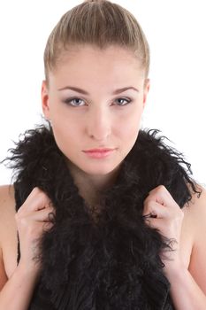 young beautiful girl in a black fur coat