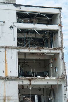 Demolition of a building house in a construction site