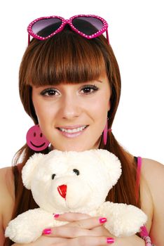Teenage girl with teddy-bear studio shot