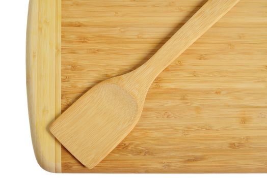 Wooden kitchen board with a spatula. Isolated on white background.