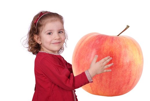 little girl holding big apple