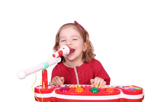 little girl sing and play music