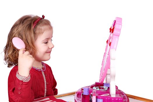 little girl with comb