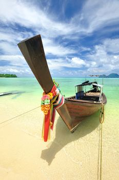 Traditional Thai boat in beautiful beach landscape in Thailand