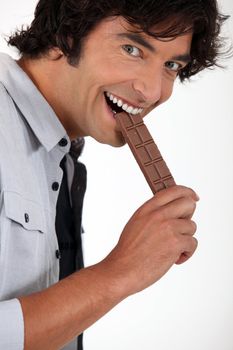 man eating chocolate