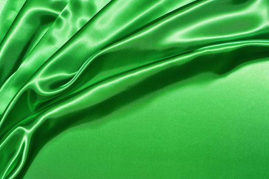 Beautiful folded green silk background