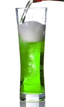 Green Beer mug isolated on white. Pouring green beer in it.