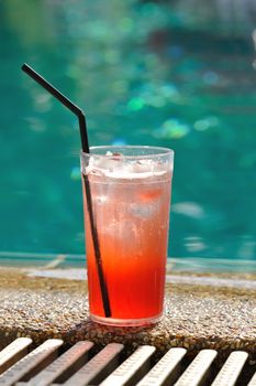 Cocktail near the swimming pool, very shallow depth of field