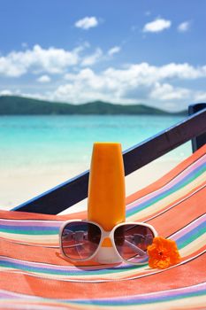 Sunscreen lotion on a beautiful beach 