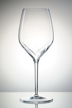 Empty wine glass with reflection