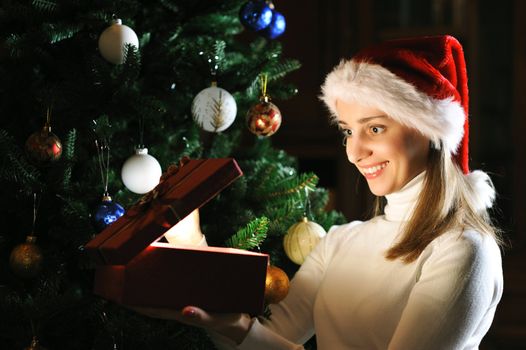 Young woman with Christmas present