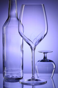 Glass still life over blue background