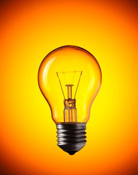 Light Bulb over colourful background