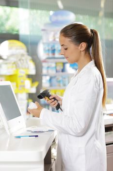 Portrait of a female pharmacist at pharmacy