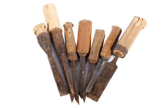 old carpenter chisels on a white background