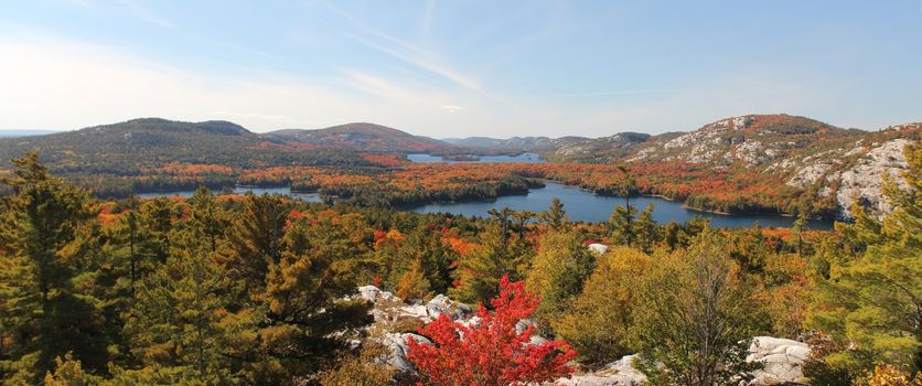 Panoramic view of the lakes, rocky hills and colourful forest at Killarney Provincial Park, Ontario, Canada. This photo is made attaching together various photos
