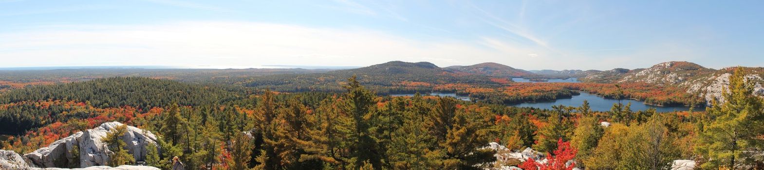 Panoramic view of the lakes, rocky hills and colourful forest at Killarney Provincial Park, Ontario, Canada. This photo is made attaching together various photos
