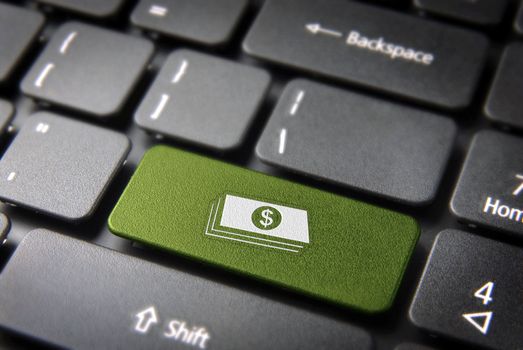 Make money with internet: green key with dollar bills icon on laptop keyboard. Included clipping path, so you can easily edit it.