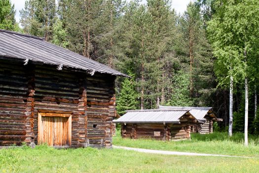 A traditional wooden shades and a house
