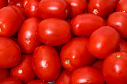 Lot of Red Tomatoes background, closeup