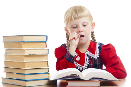 little girl thinking over the homework