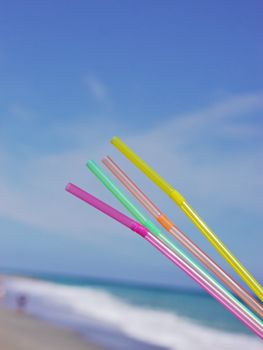 drinking straws beach drink outside at ocean