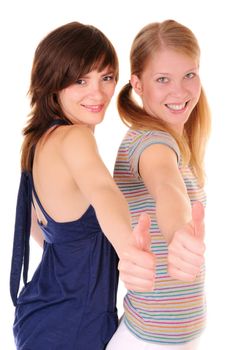 Two smilling girls are showing thumbs up on white background. Focus on hands.