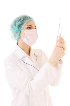 Nurse in mask and cap with syringe in hands isolated on white background