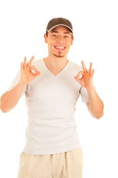 Young smiling worker shows Ok sign by two hands. Isolated on white background.