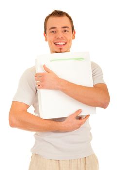 Smiling handsome man is embacing white gift paper bag. Isolated on white background.