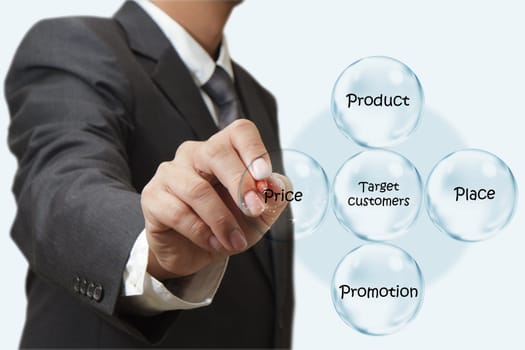 businessman hand draws target customers diagram