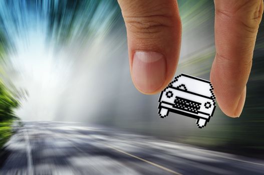 close up of hand picks pixel car icon on blur background