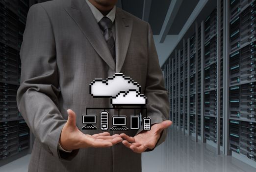 Businessman show cloud network icon on server room background