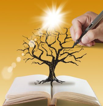 open book of hand drawn Silhouette dead tree without leaves