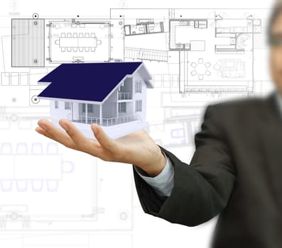 Businessman present house model and plan on touch screen