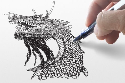 business hand draws a dragon on whiteboard
