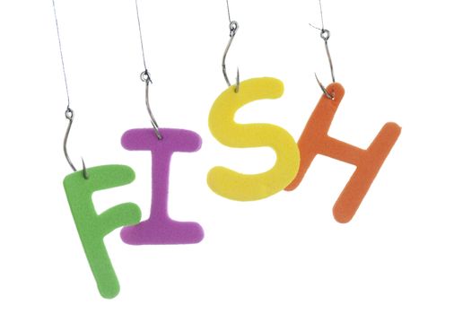 Close up image of fishing lures with alphabets trick in it against white background