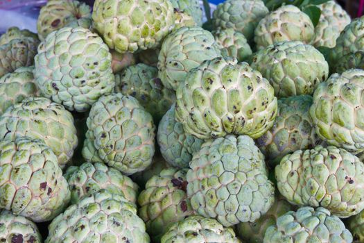 Pile of sugar apple for sale, Asian fruit