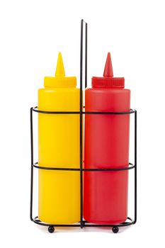 Close-up image of a mustard and catsup bottle isolated on the white background