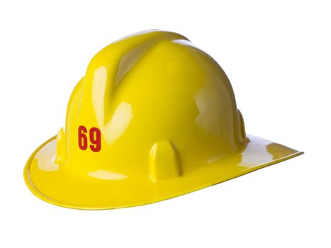 Close up image of yellow fireman helmet against white background