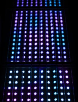 Colorful light spots display matrix background black