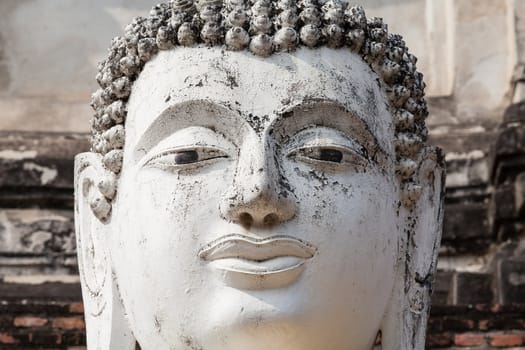 Head of buddha statue at thai temple.